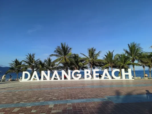 Panoramic view of My Khe Beach area showing My Khe Beach, Pham Van Dong Beach with white doves, and rustic T20-T18 Beach in Da Nang, Vietnam