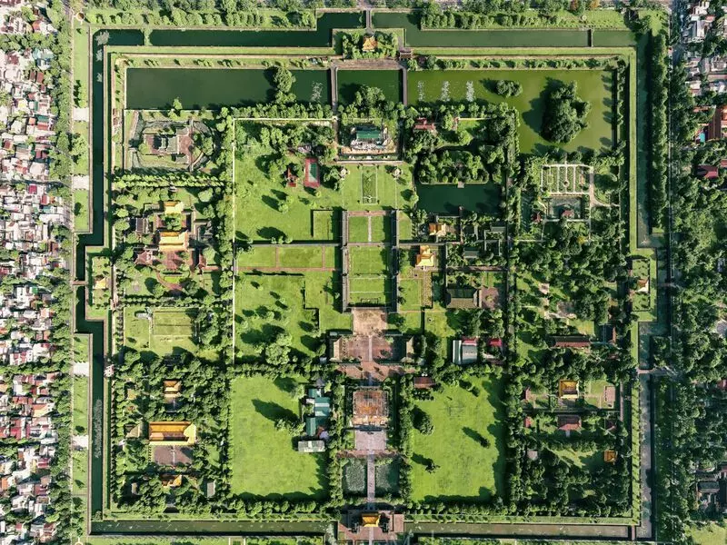 Introduction to Hue, Vietnam: The Imperial City of Culture and Charm Aerial view of Hue Imperial City in Vietnam, featuring historic walls, palaces, and traditional Vietnamese architecture.